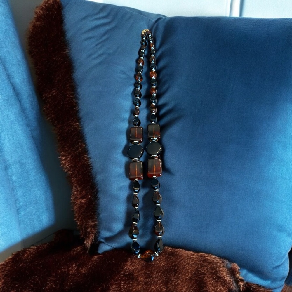 Vintage black, brown and gold tone lucite beaded necklace. 18”
